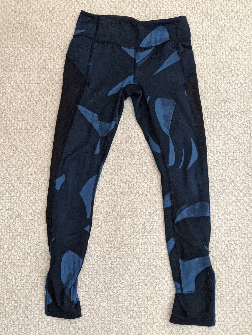Lululemon Black Leggings with Blue Abstract Print and Ankle Zippers